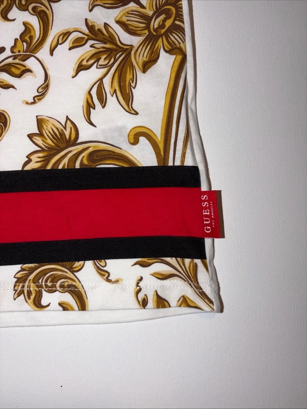 GUESS White T-Shirt with Gold Baroque Print and Red-Black Hem Stripe M - Picture 3 of 6